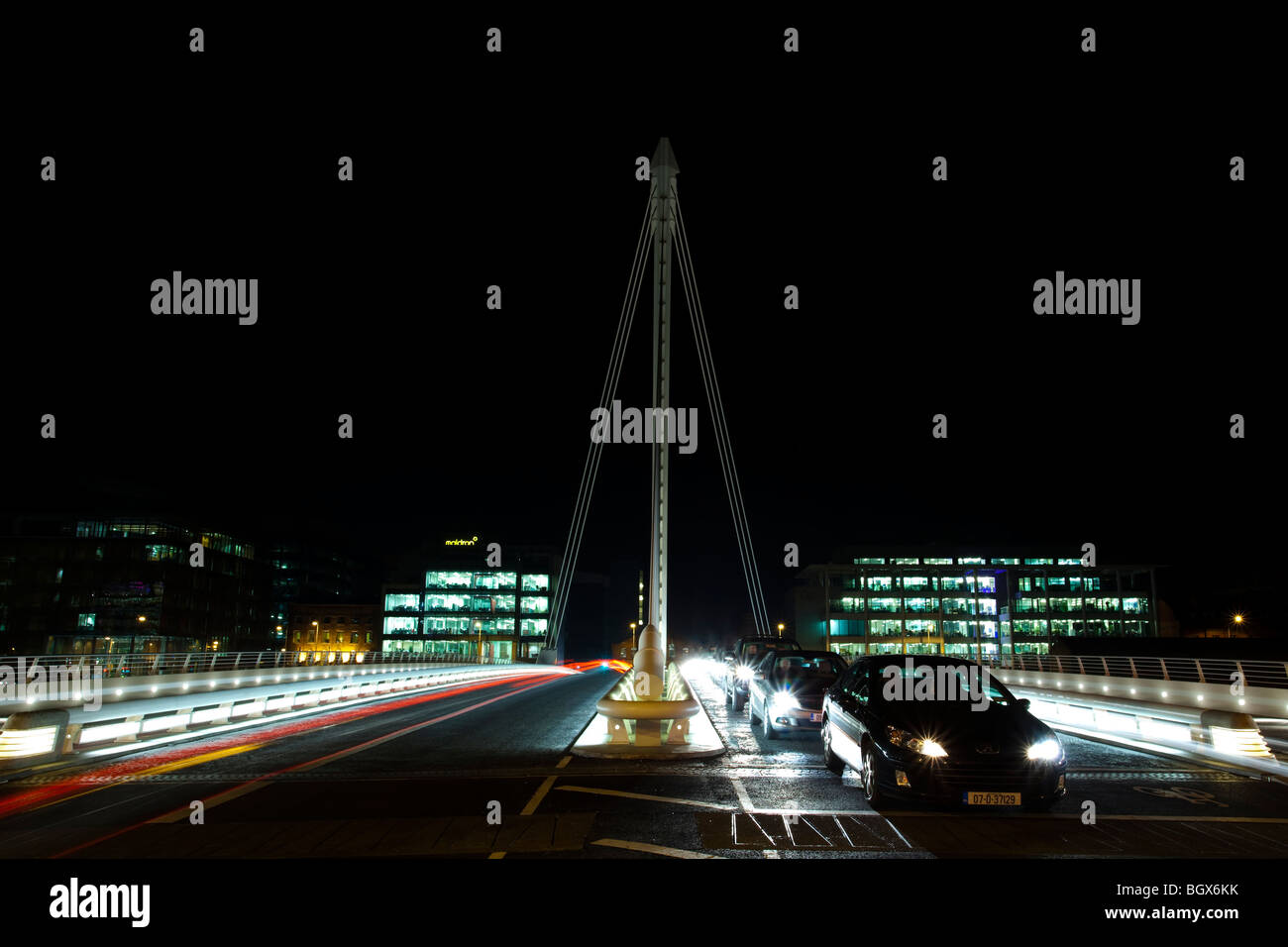 Samuel Beckett Bridge over the Liffey River at night, in Dublin ...