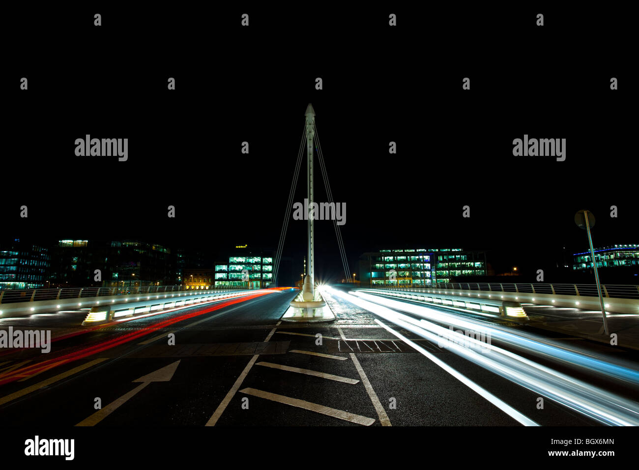 Samuel Beckett Bridge over the Liffey River at night, in Dublin ...