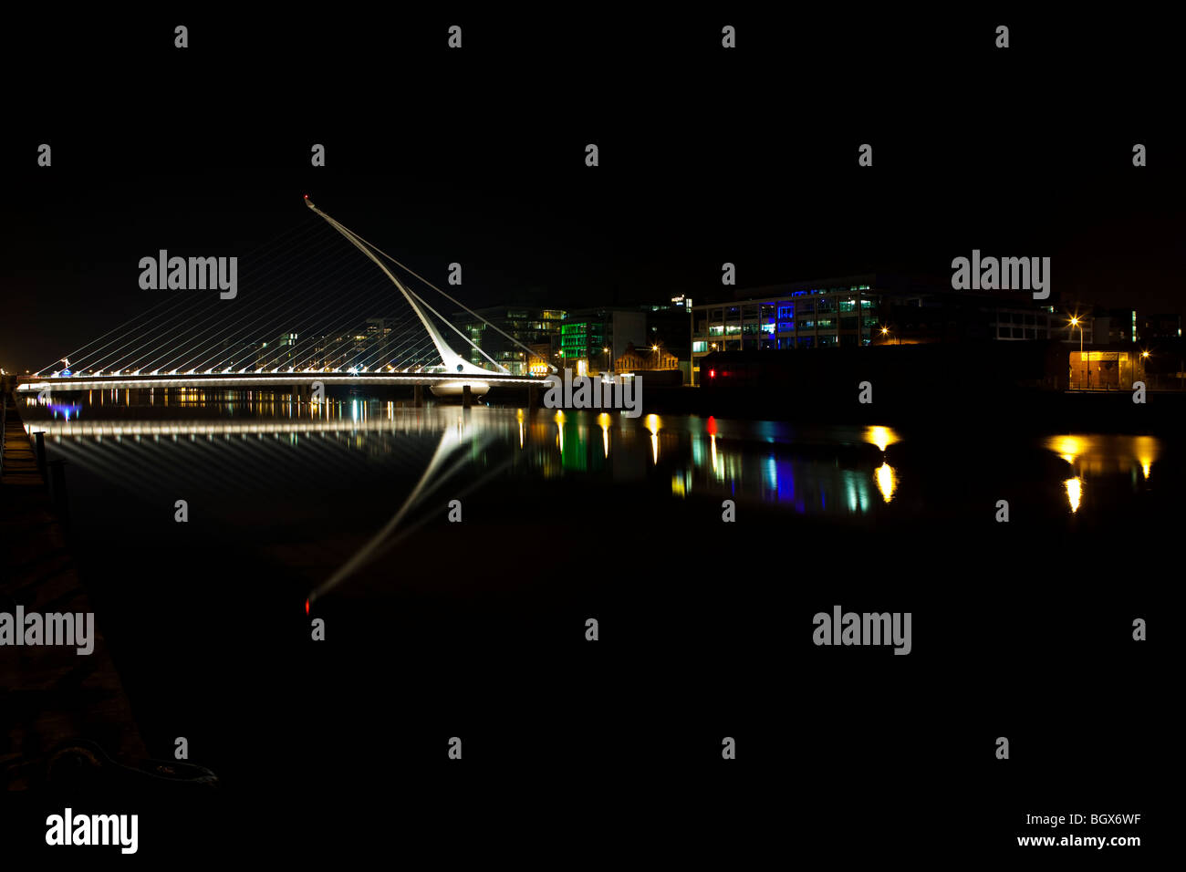 Samuel Beckett Bridge over the Liffey River at night, in Dublin ...