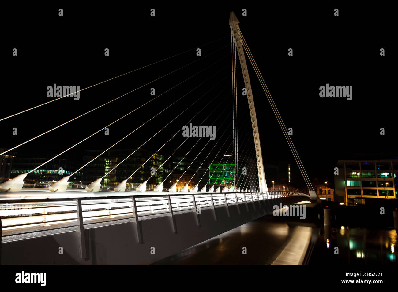 Samuel Beckett Bridge over the Liffey River at night, in Dublin ...