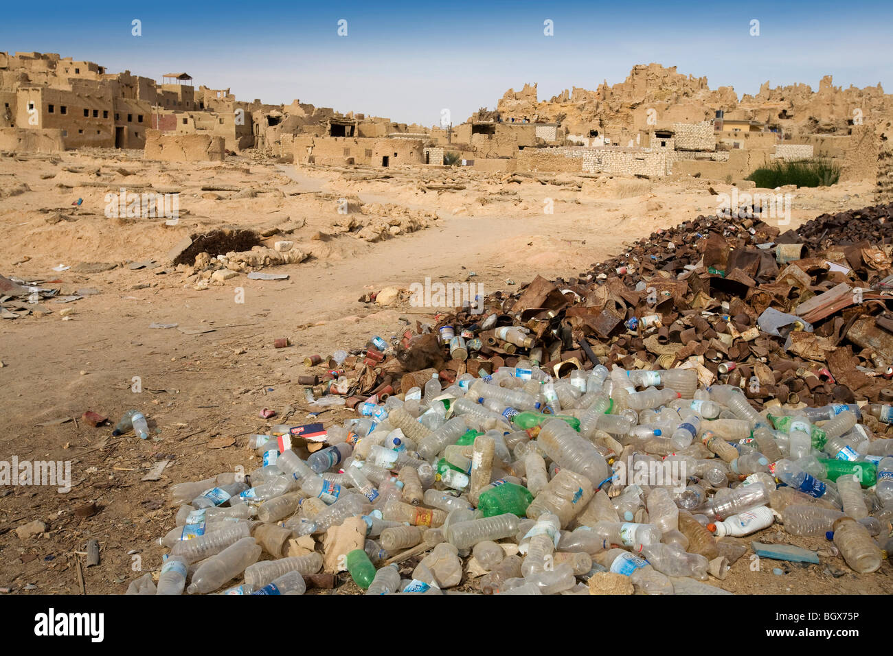 Tombs in Siwa Oasis with garbage pile nearby Stock Photo