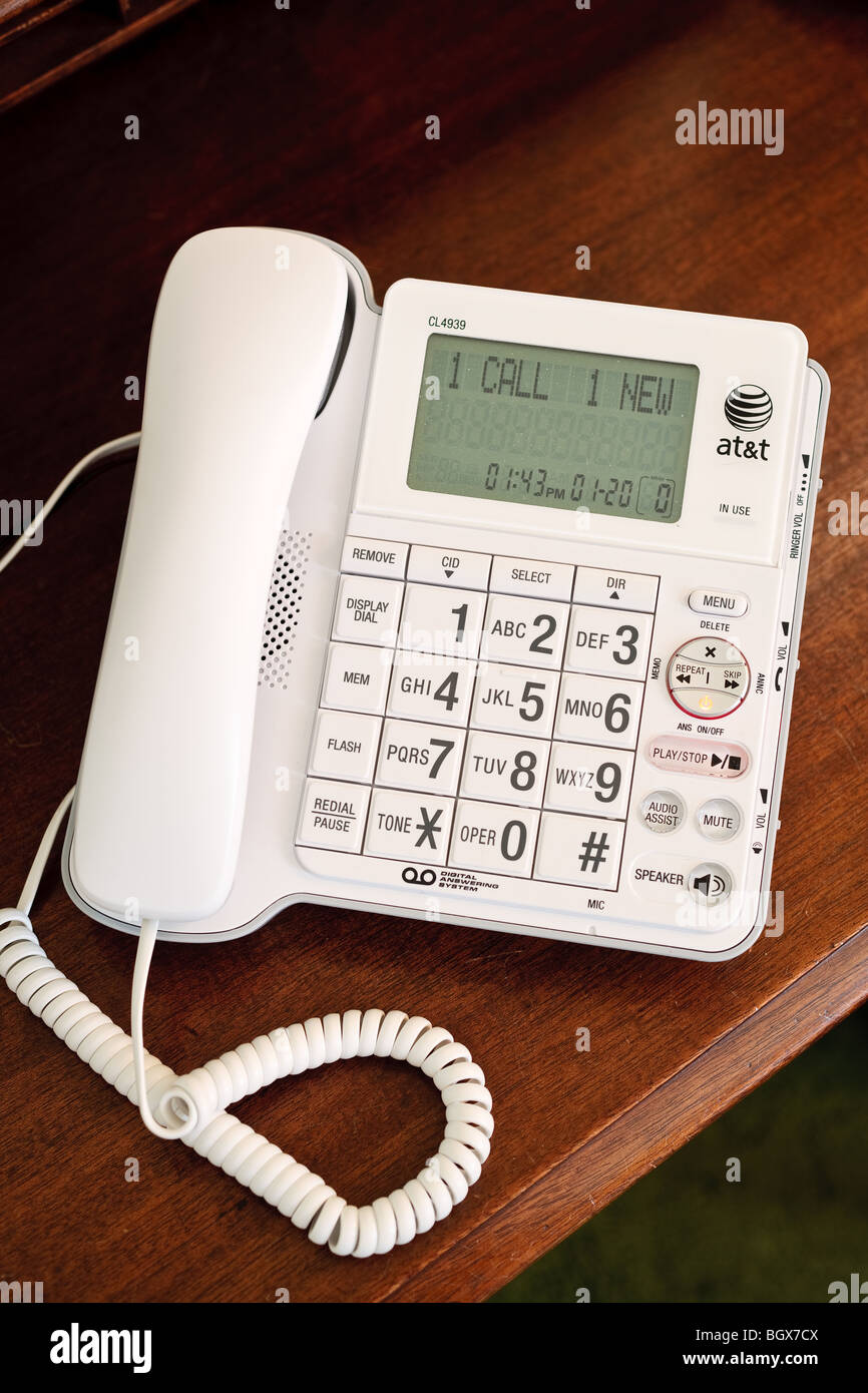 A telephone on a desk Stock Photo