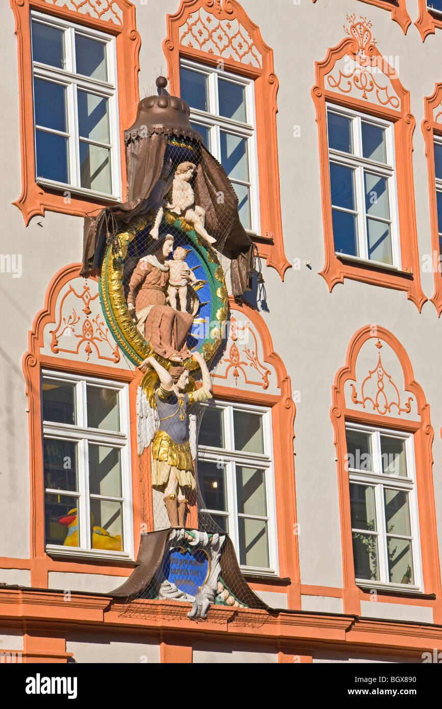 Religious motif on the facade of a building in the Old Town district in the City of Landshut, Bavaria, Germany, Europe. Stock Photo