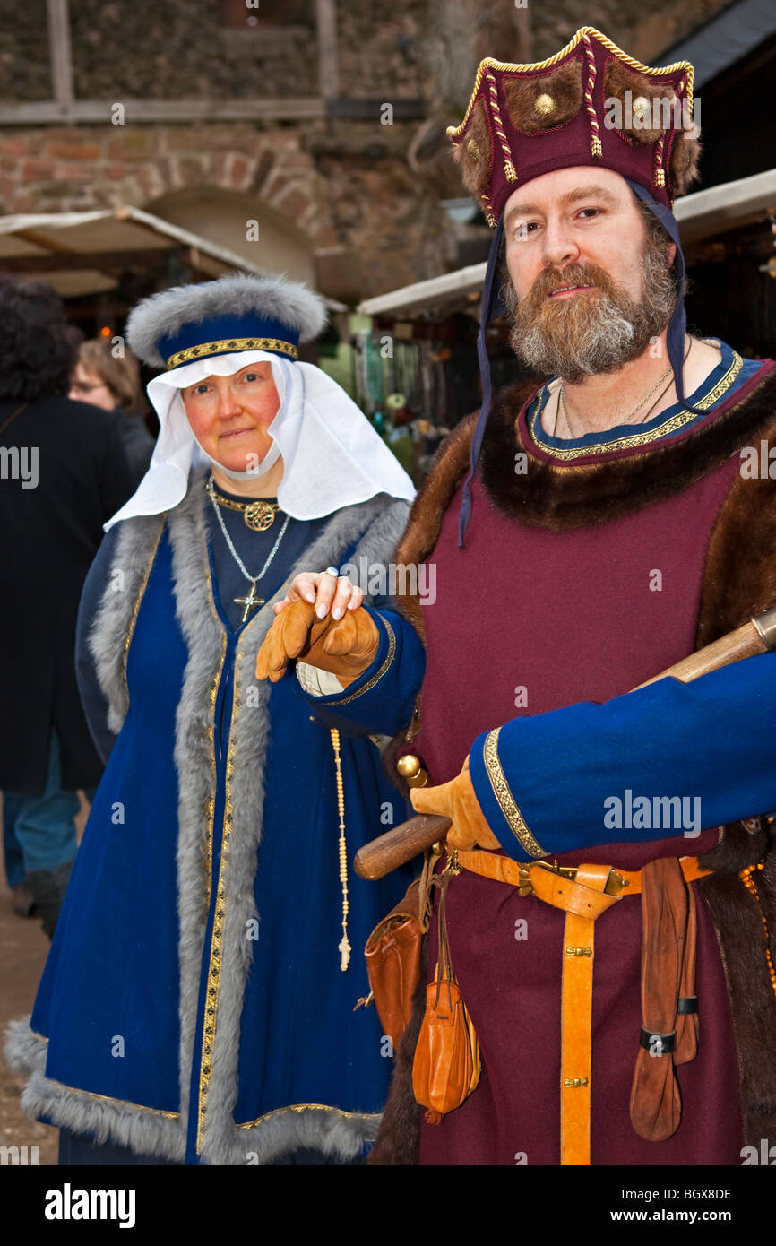 Man and woman dressed in medieval clothing during the medieval markets on the grounds of Burg Ronneburg (Burgmuseum), Ronneburg  Stock Photo
