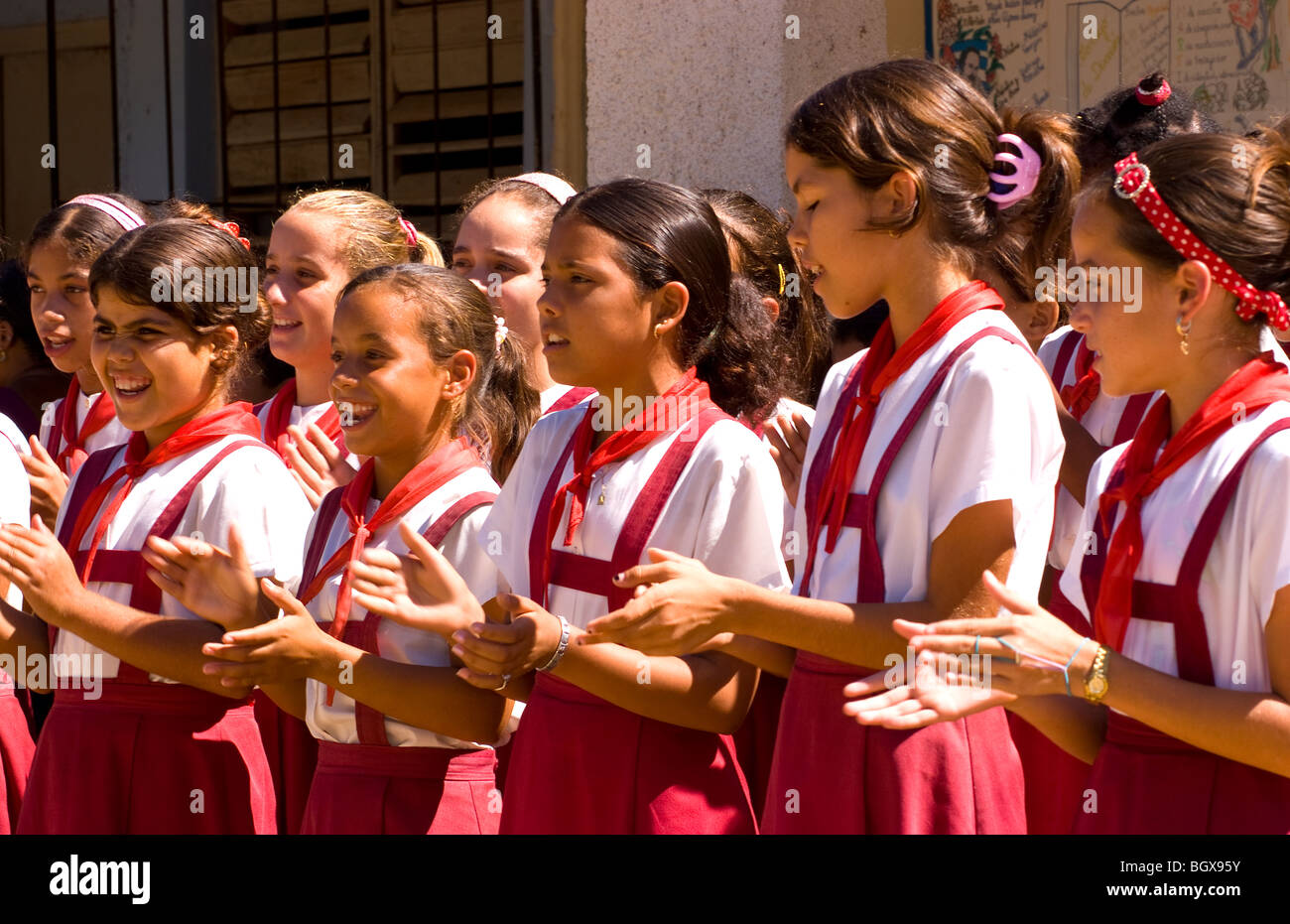 students performing singing at elementary school in small village of