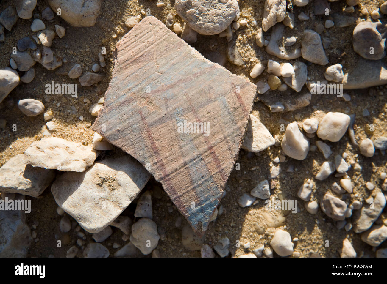 Amarna style pottery shards on the desert floor at the site of Tell el ...