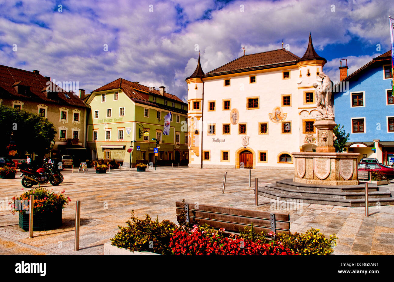 Town square in Mauterndorf Austria with flowers and colorful buildings ...