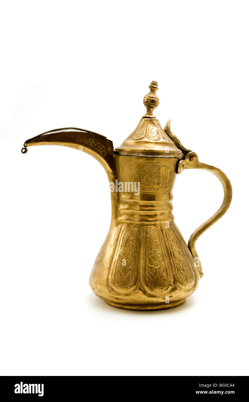 Antique arab teapot on a white background Stock Photo