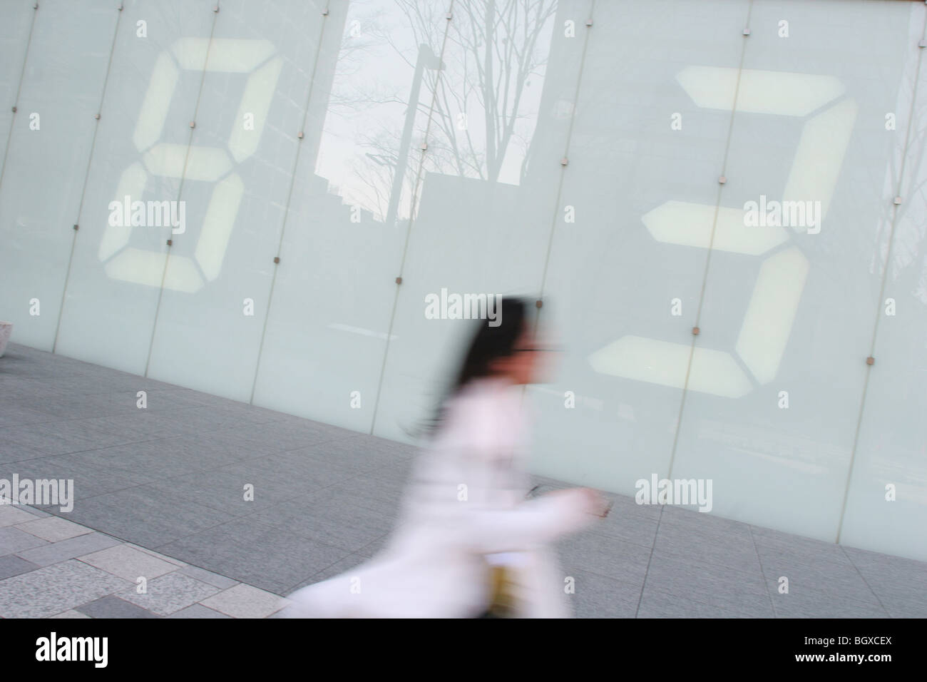 Digital wall display, by artist TATSUO MIYAJIMA,  outside TV Asahi building, in Roppongi, Tokyo, Japan. Stock Photo