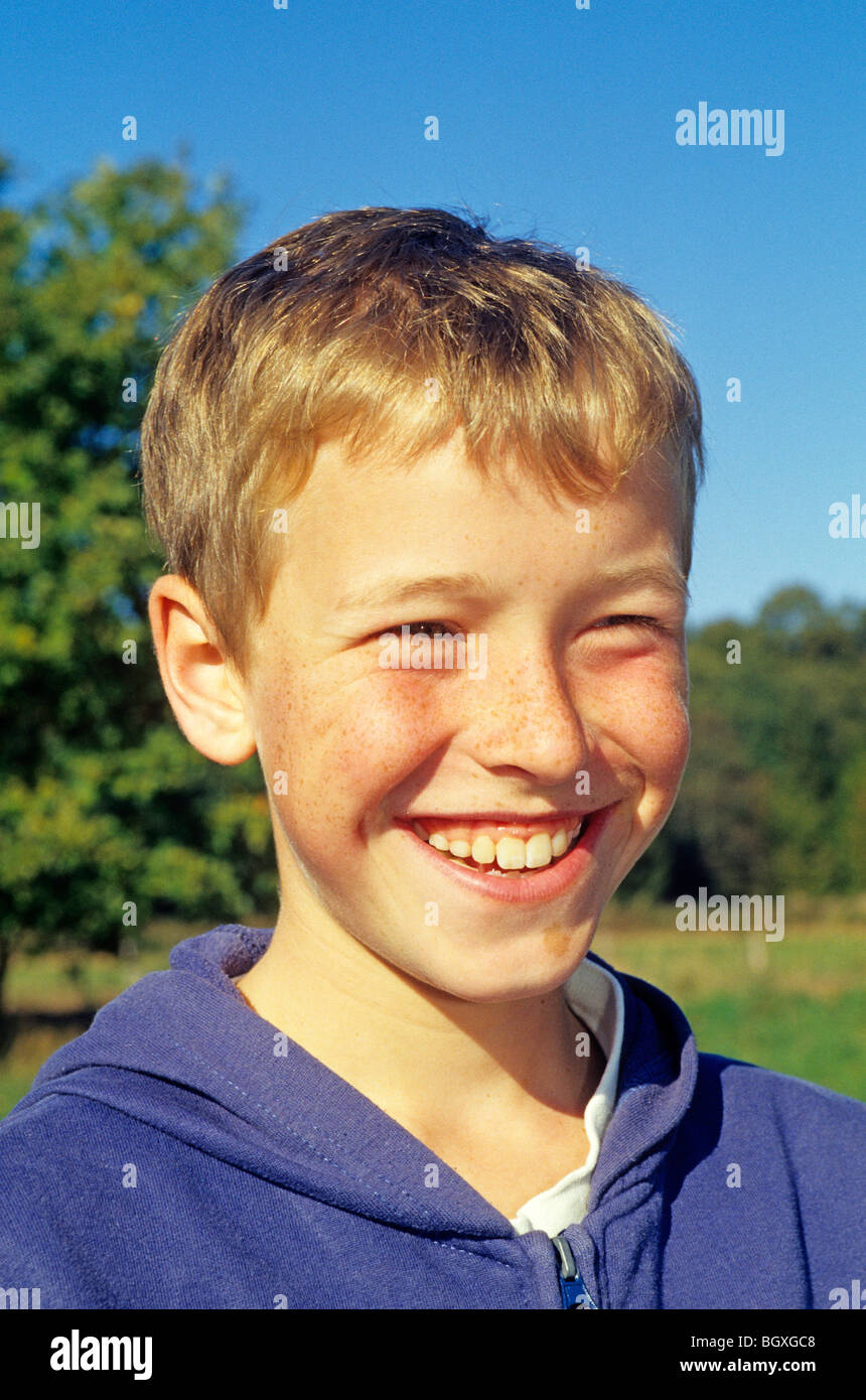 portrait of a smiling young boy Stock Photo