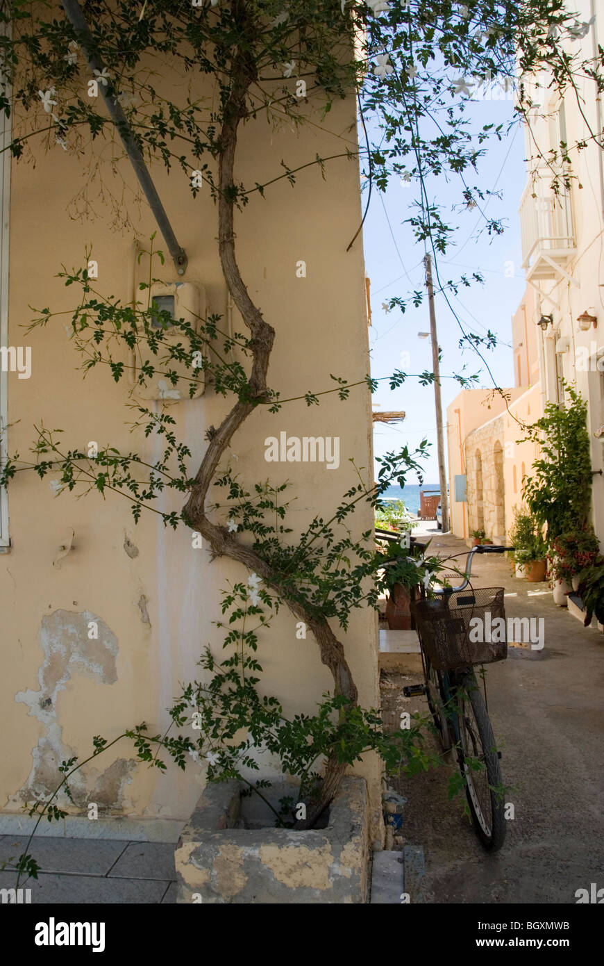 An alleyway leading to the sea in Greece Stock Photo