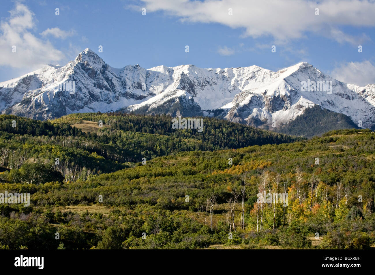 Snow covers Mt. Sneffels and surrounding peaks in the Mt. Sneffels Wilderness area near Dallas Divide Stock Photo