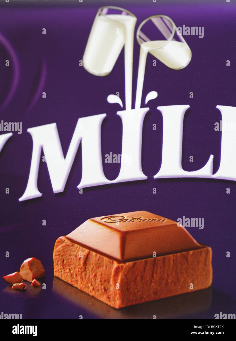 A close up of the wrapper on a bar of Cadbury's milk chocolate. Stock Photo