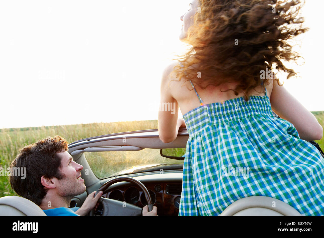 Couple in a convertible Stock Photo