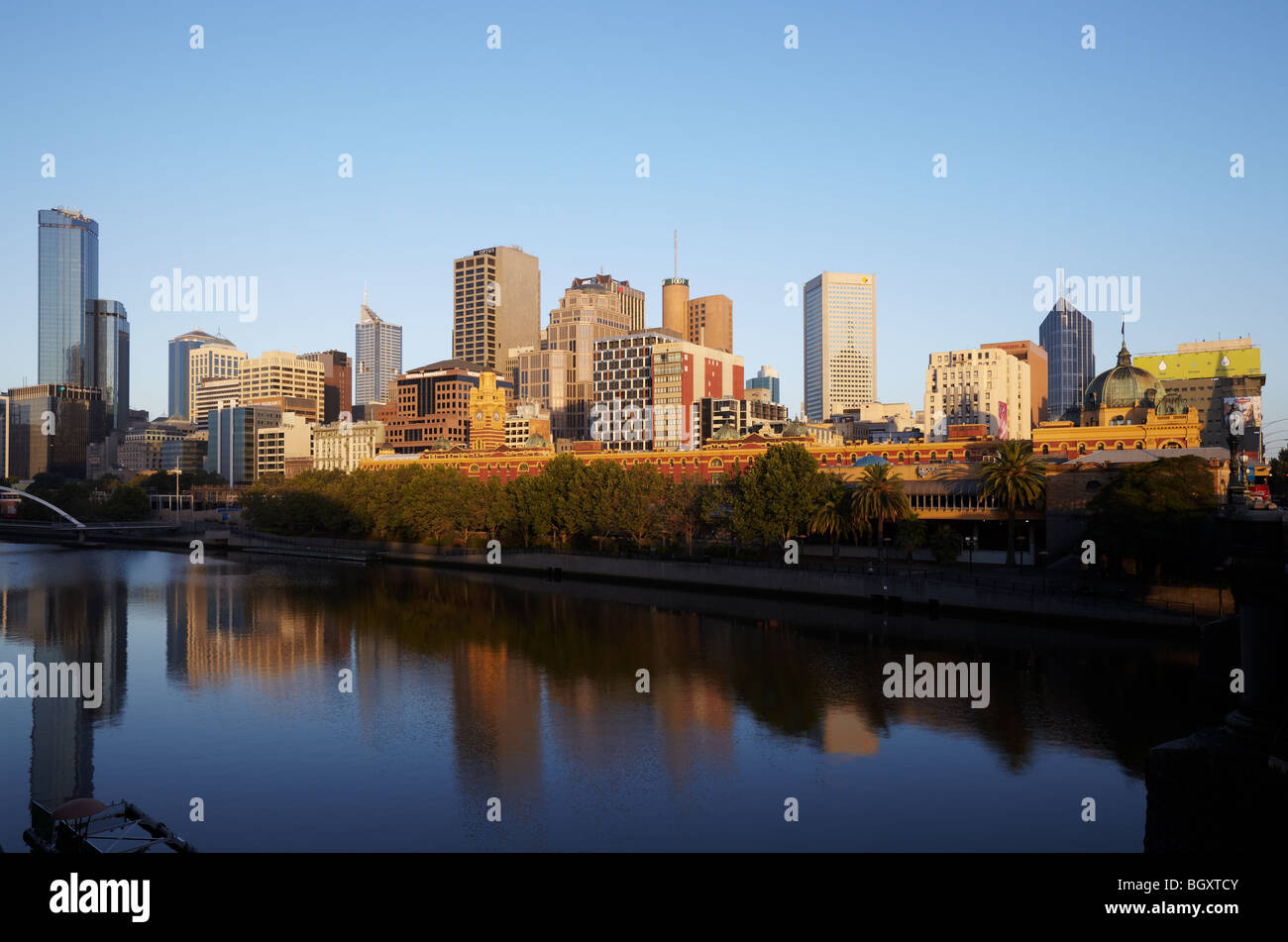 City skyline across the Yarra river at dawn Melbourne, Victoria, Australia Stock Photo