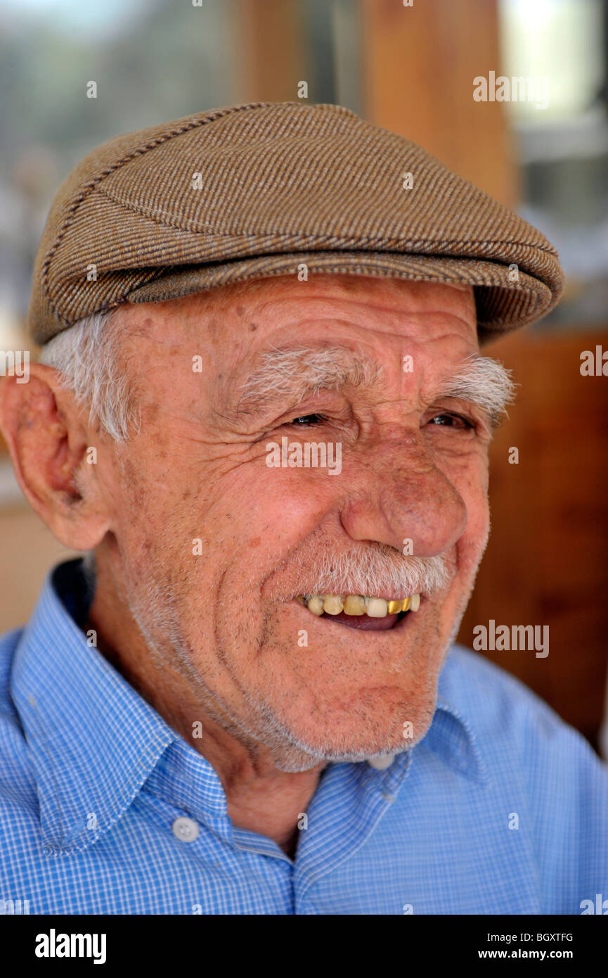 turkish man with cloth cap and gold teeth Stock Photo