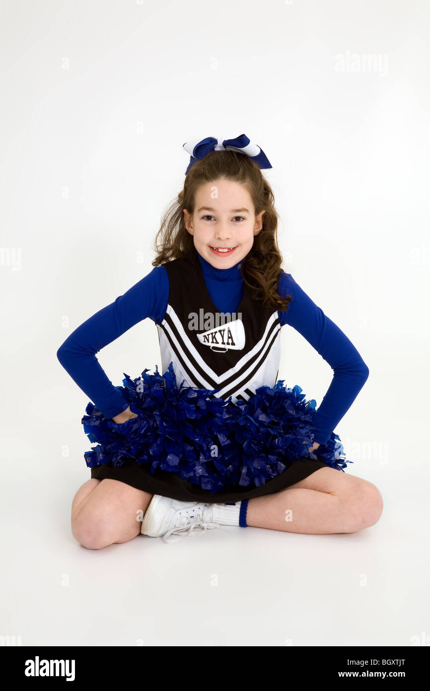 Nine year old girl dressed as cheerleader Stock Photo Alamy