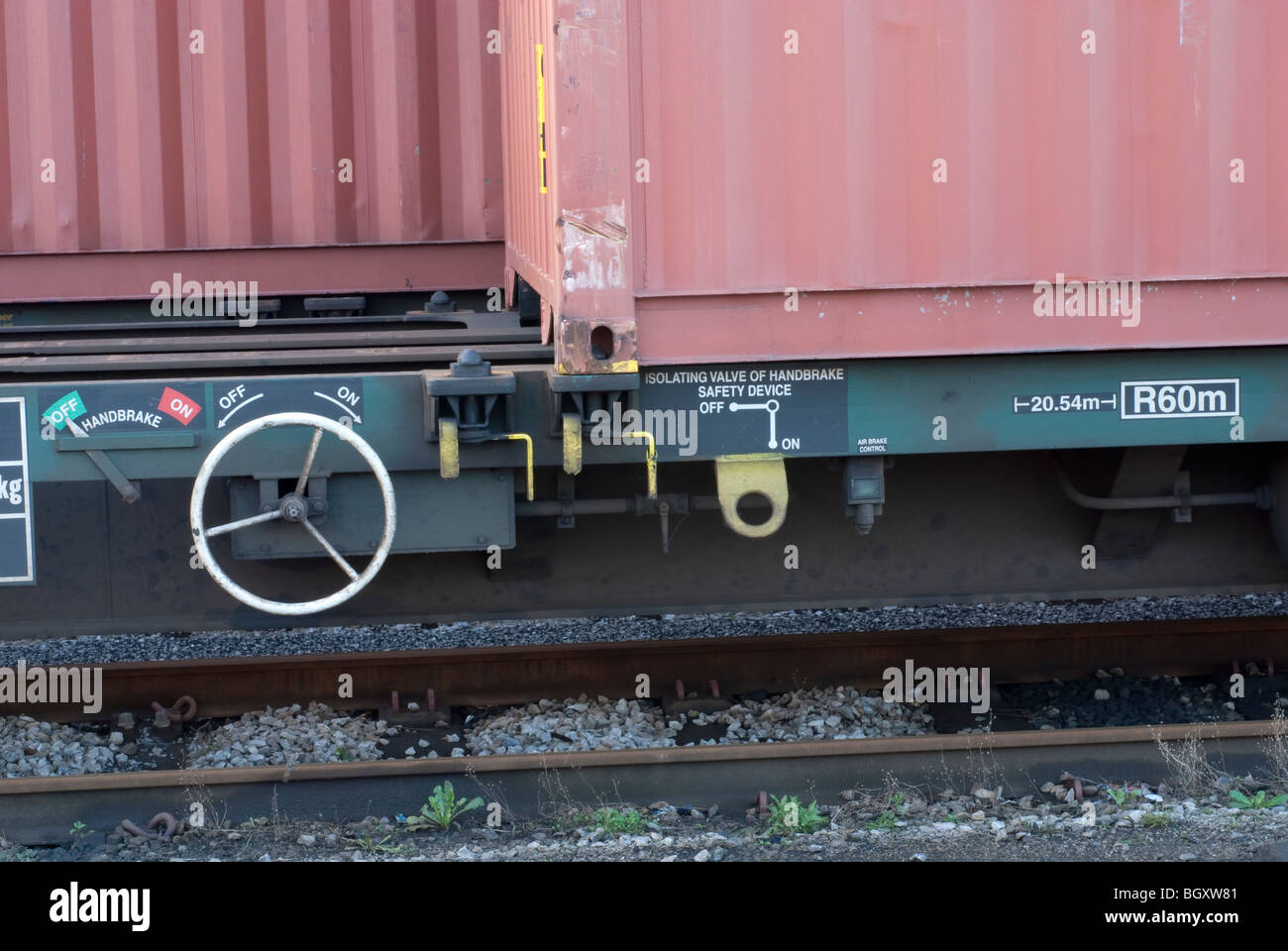 shipping container on rail carriage bogie at depot Stock Photo