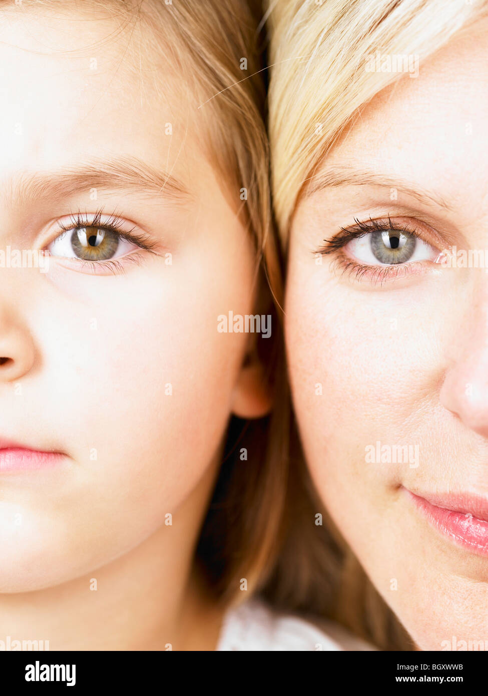 Mother and daughter looking at camera Stock Photo