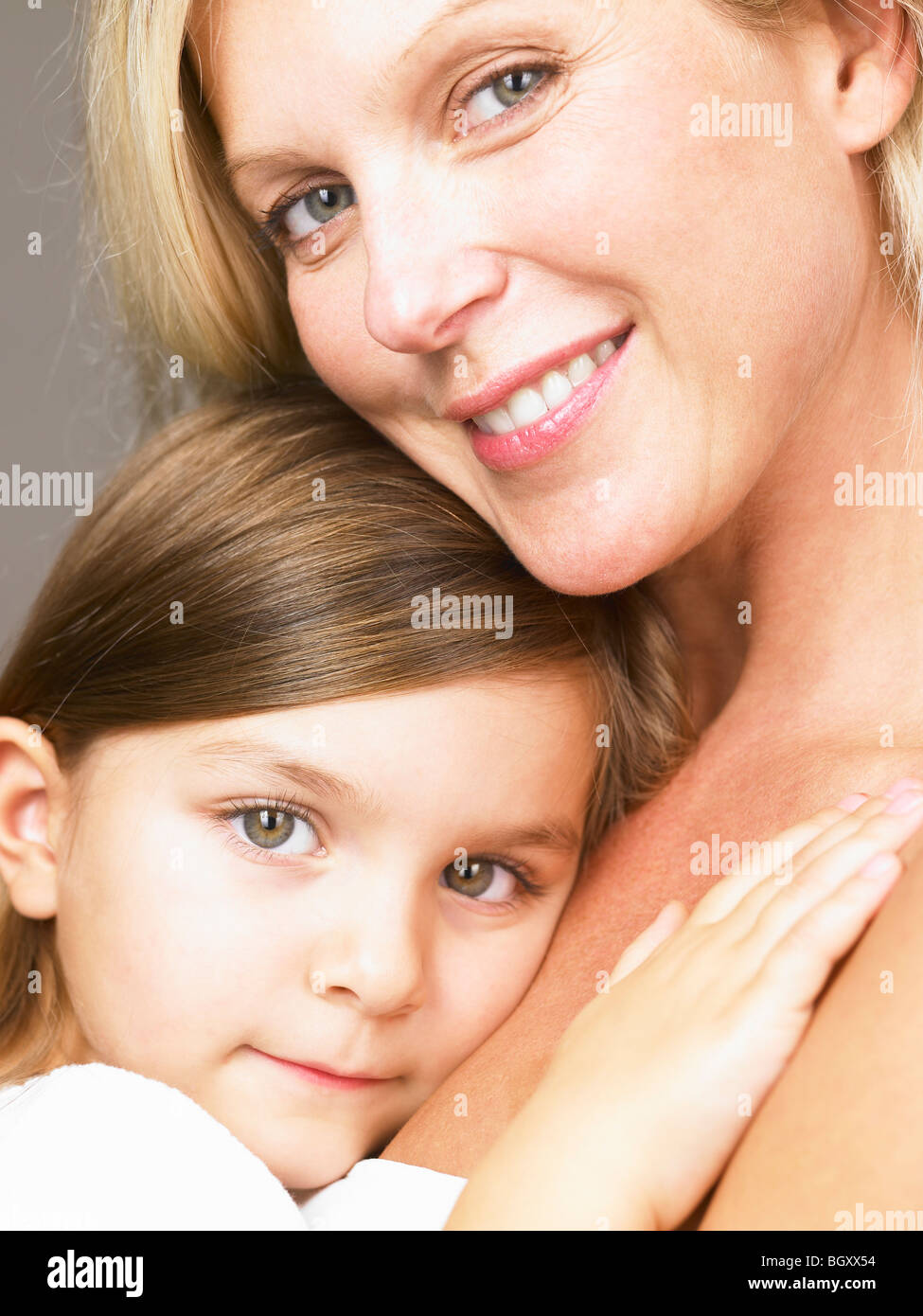 Mother and daughter looking at camera Stock Photo Alamy