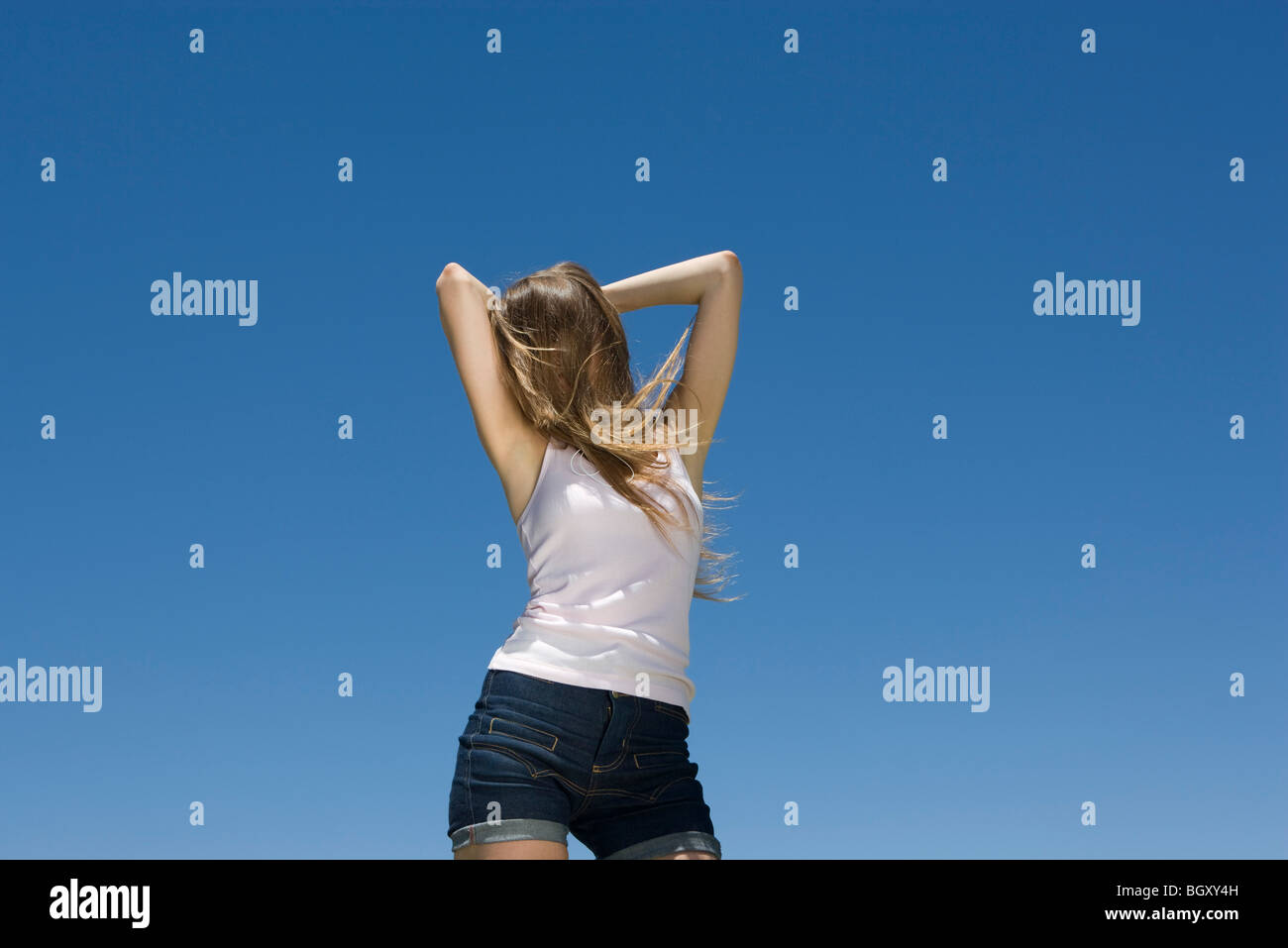Young woman dancing outdoors Stock Photo