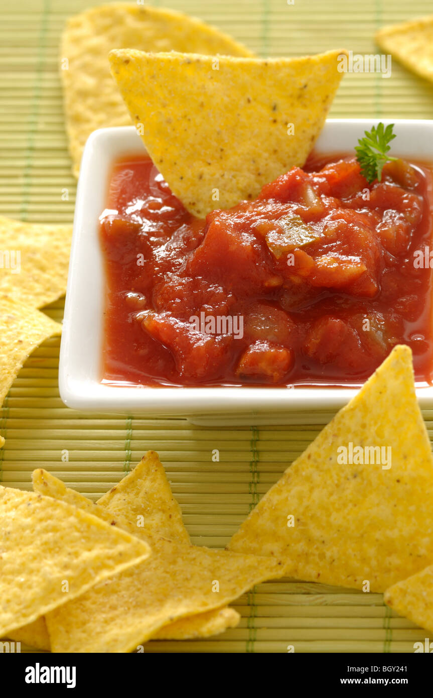 Mexican nachos and red dip Stock Photo