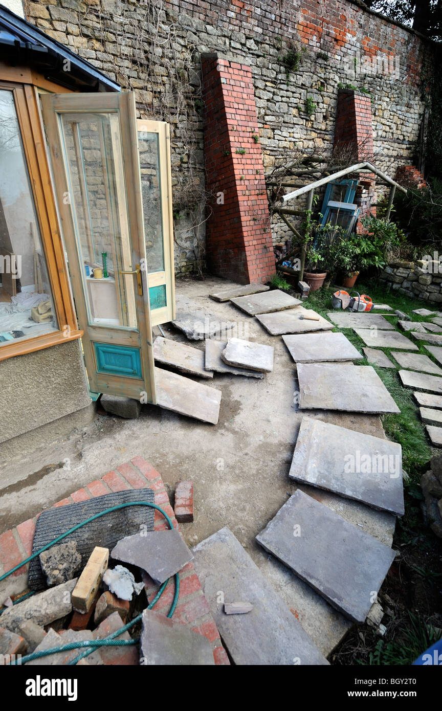 Natural stone slabs laid out in the planning of a patio, Gloucestershire UK Stock Photo