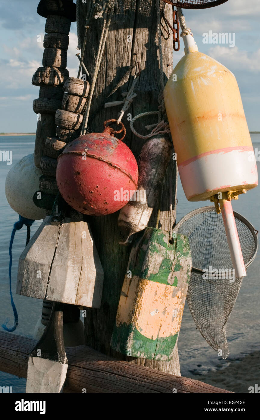Buoys hanging on a dock on Cape Cod Stock Photo