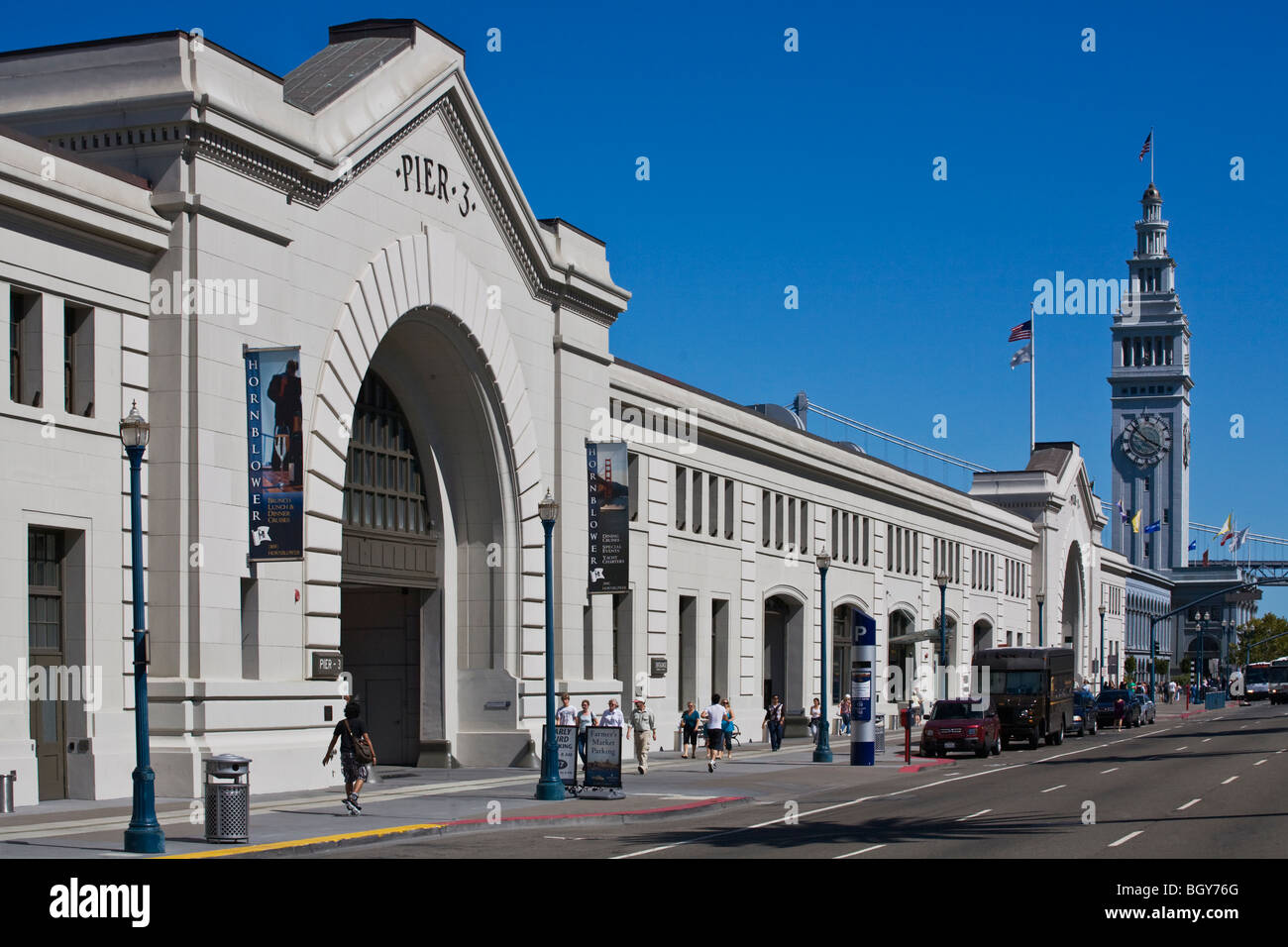 The FERRY BUILDING MARKETPLACE and PIER 3 at THE EMBARCADERO - SAN FRANCISCO, CALIFORNIA Stock Photo