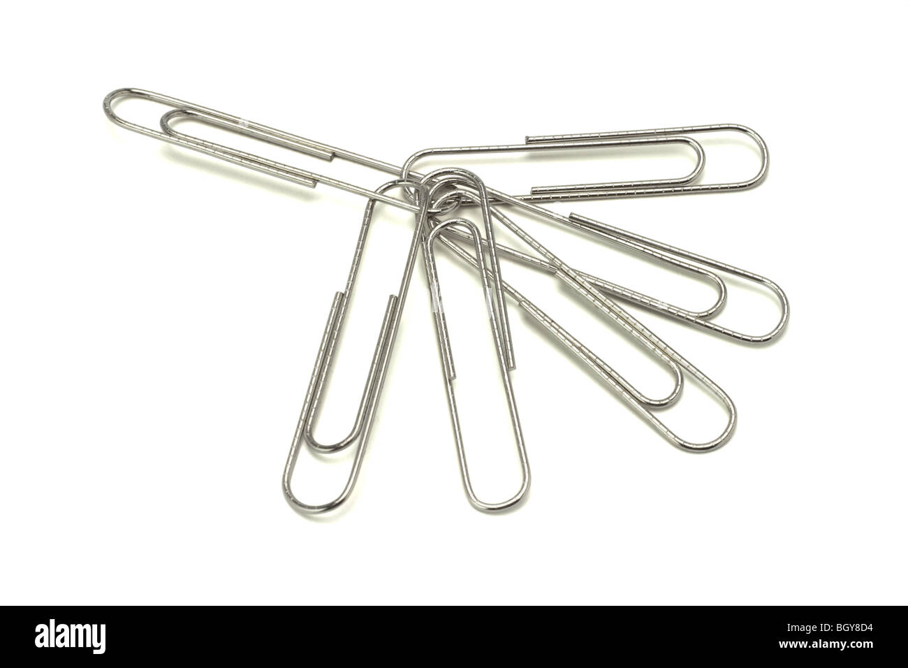 Interlocking large paper clips on white background Stock Photo