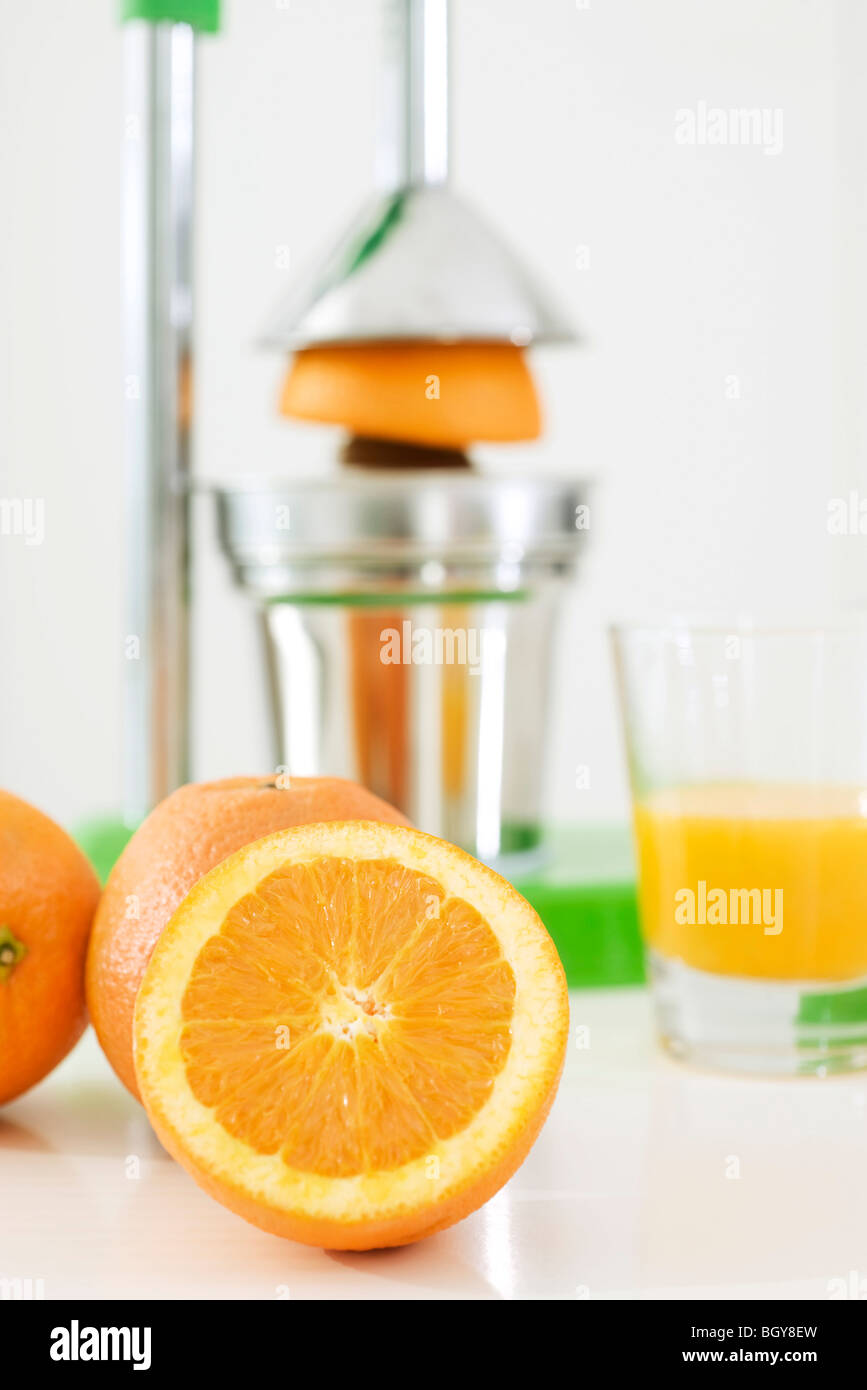 Making freshsqueezed orange juice Stock Photo Alamy