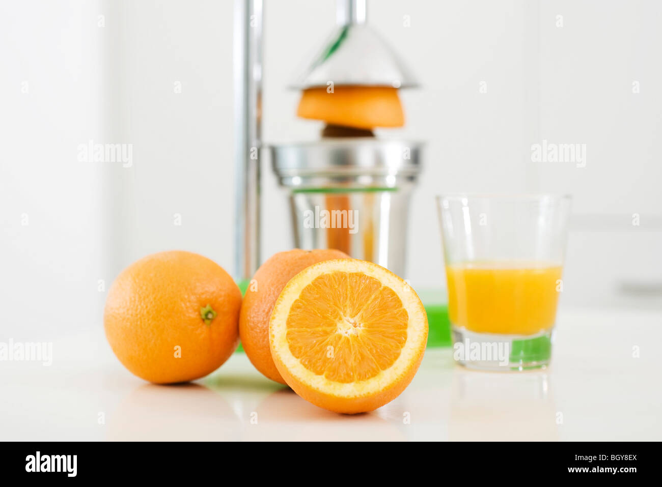 Making fresh-squeezed orange juice Stock Photo