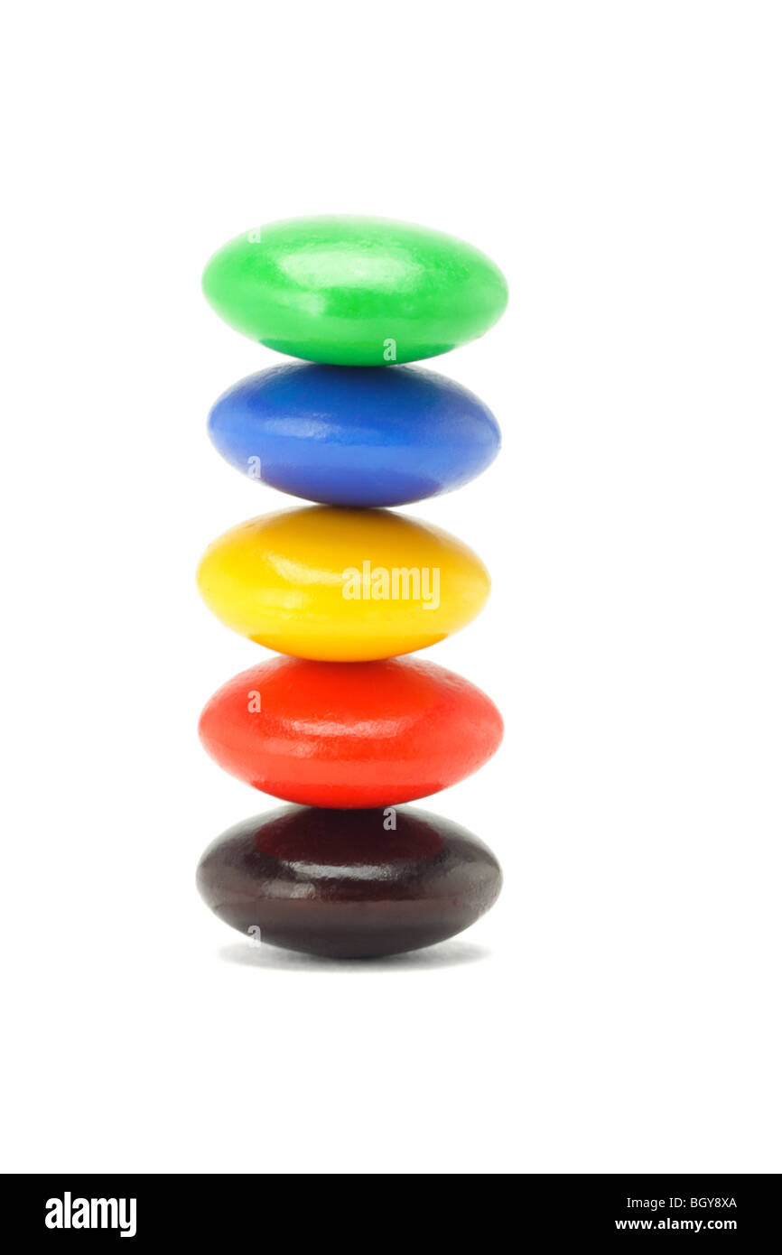 Stack of colorful button candies on white background Stock Photo Alamy
