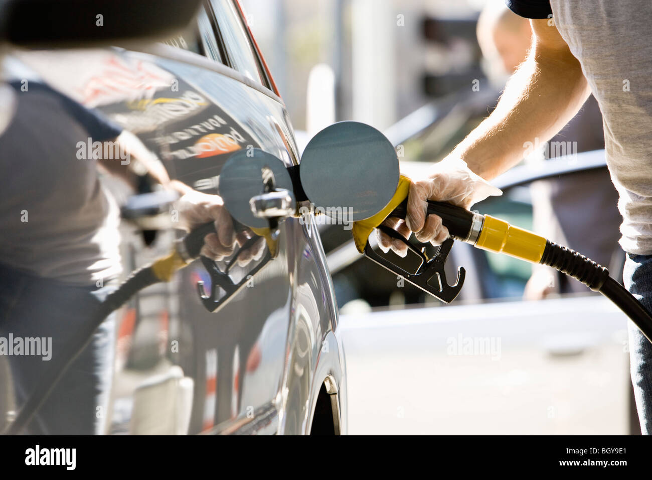 Refueling vehicle at gas station Stock Photo Alamy