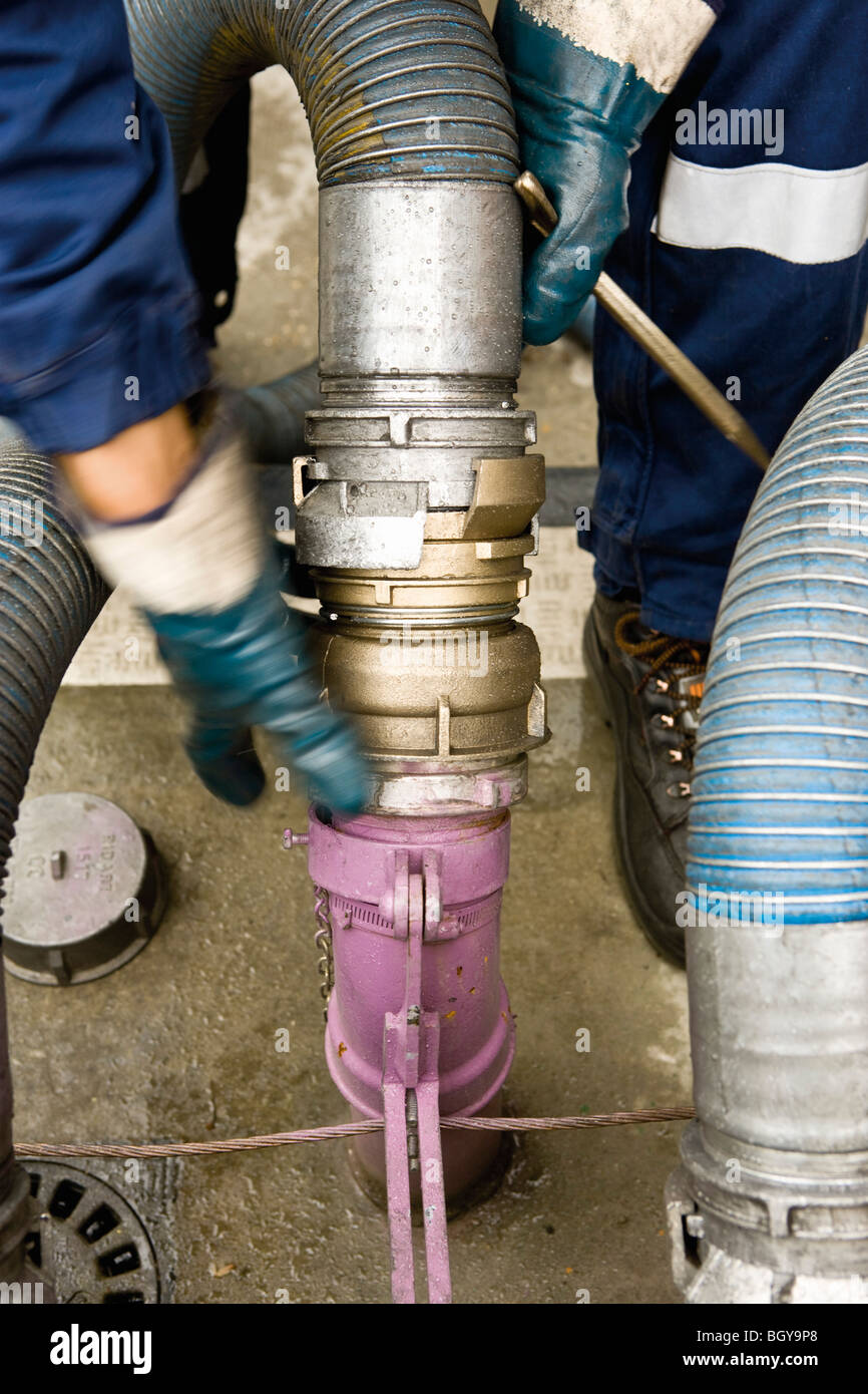 Preparing to fill gas station fuel storage tanks Stock Photo Alamy