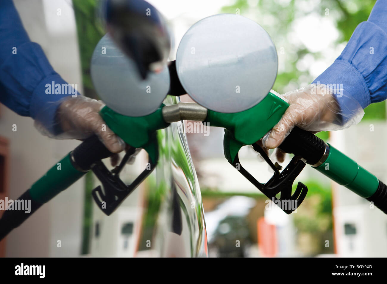 Refueling vehicle at gas station Stock Photo Alamy