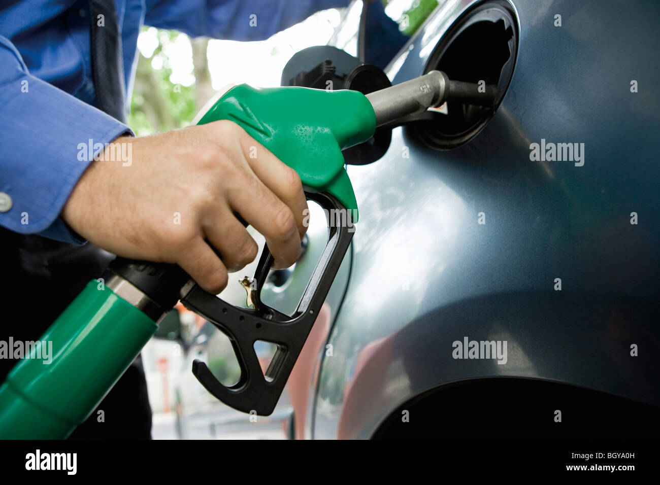 Refueling vehicle at gas station Stock Photo Alamy