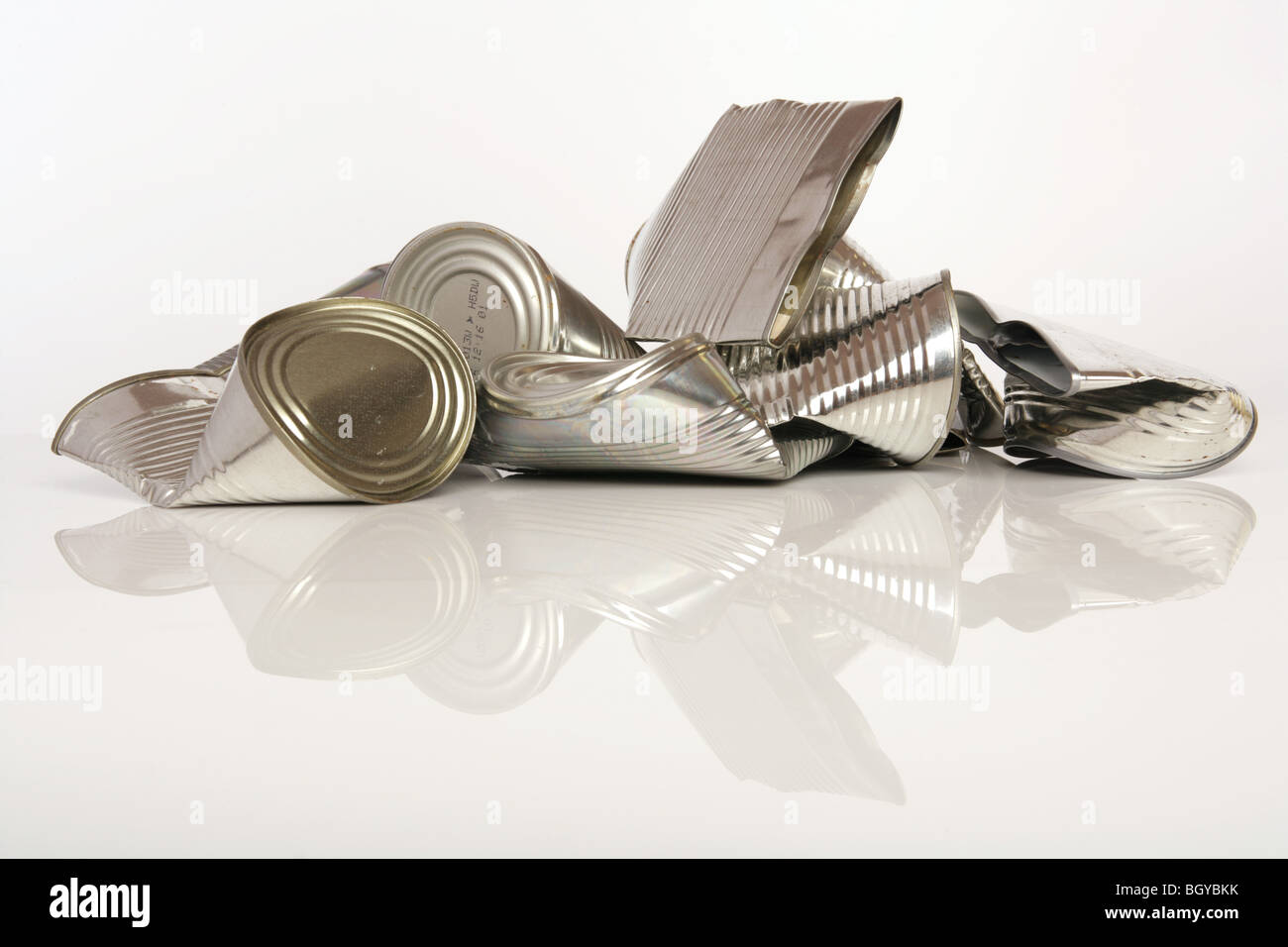 Tin food cans photographed on a reflective white background Stock Photo