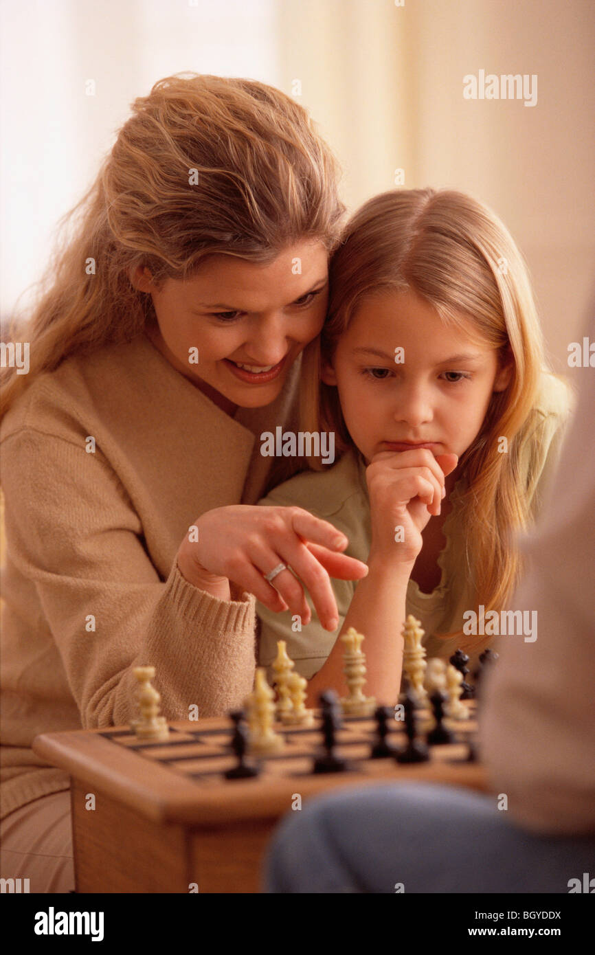 Mother and daugther playing chess Stock Photo Alamy