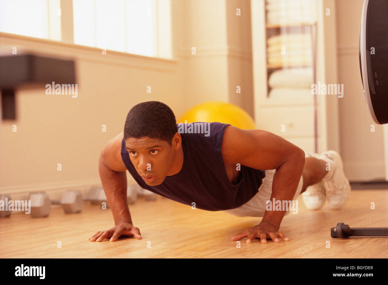 Man doing pushups Stock Photo