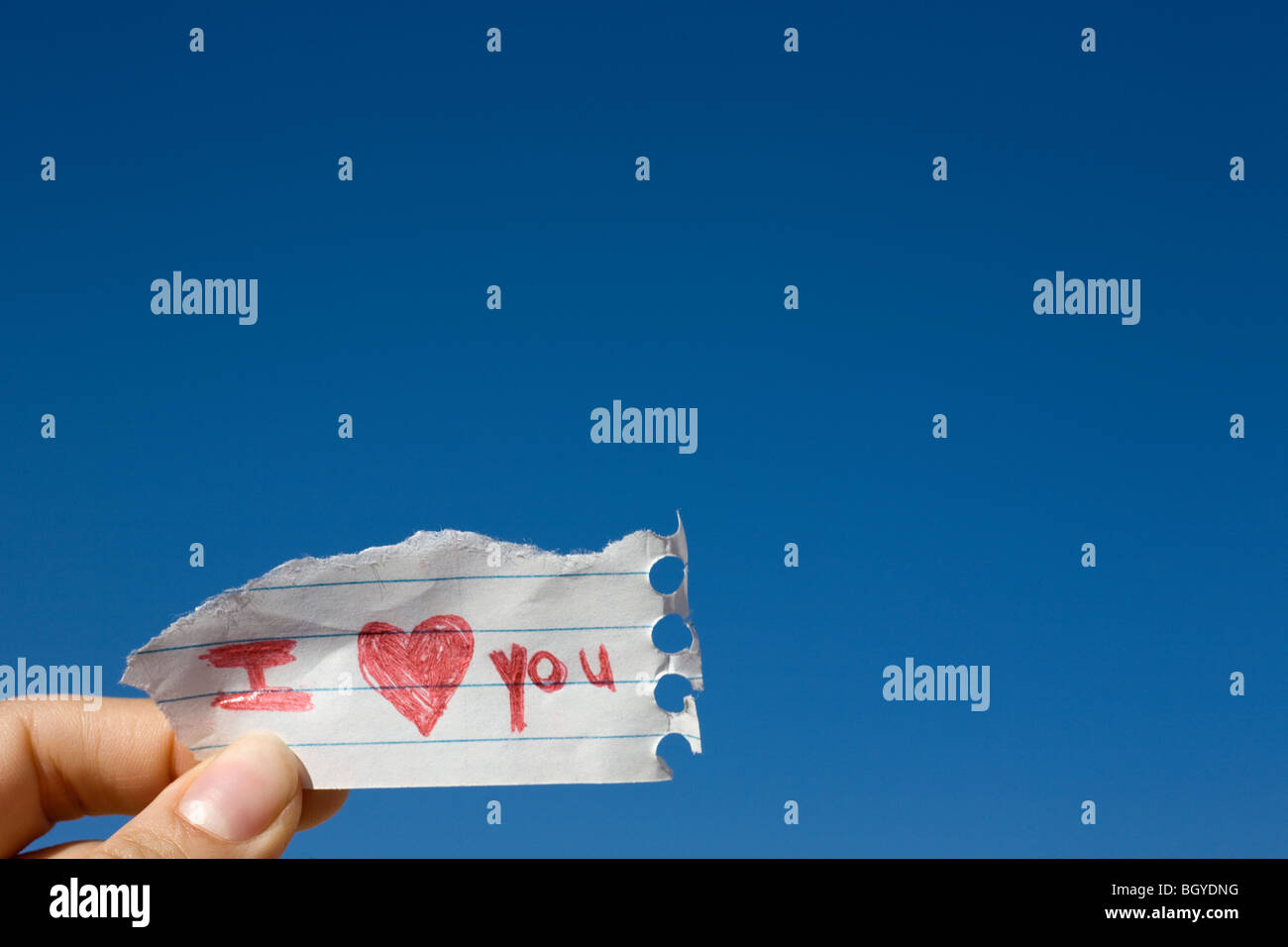 Hand holding note Stock Photo Alamy