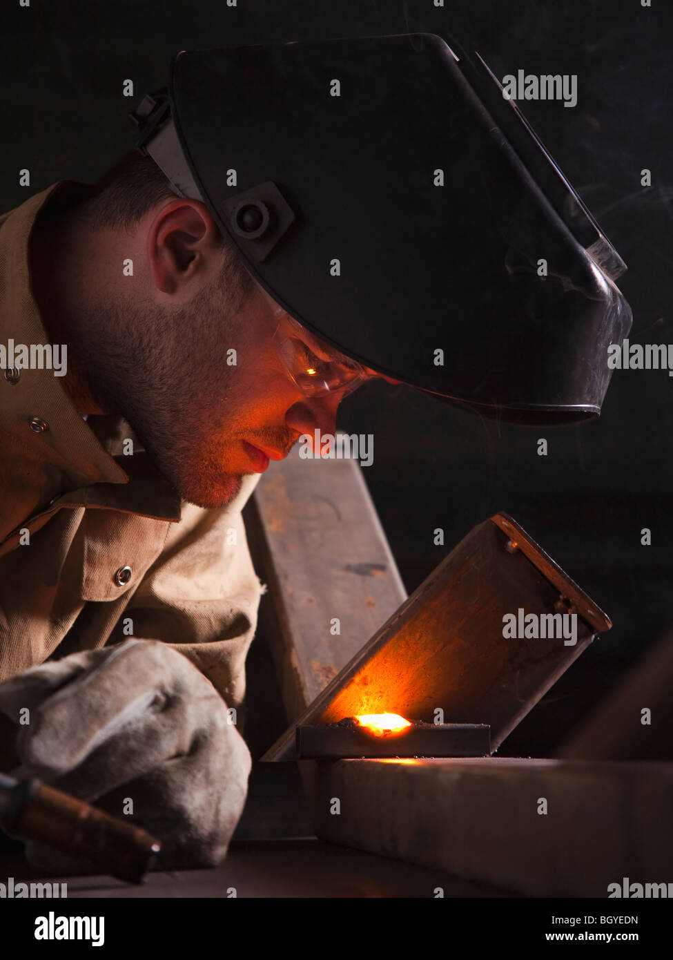 Steel worker doing quality check Stock Photo