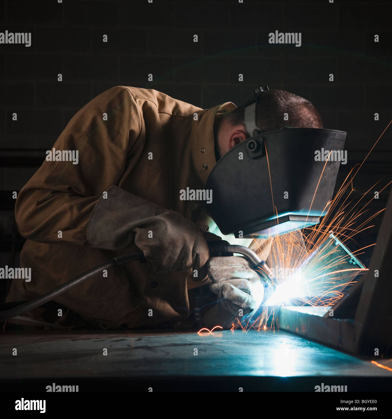 Steel worker in metal shop Stock Photo
