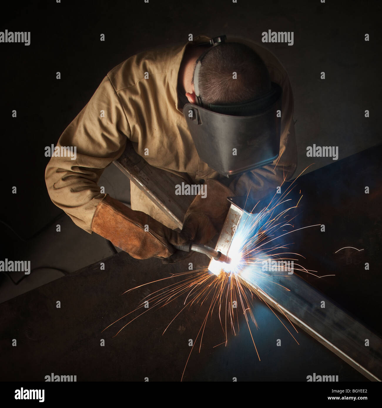 Steel worker in metal shop Stock Photo