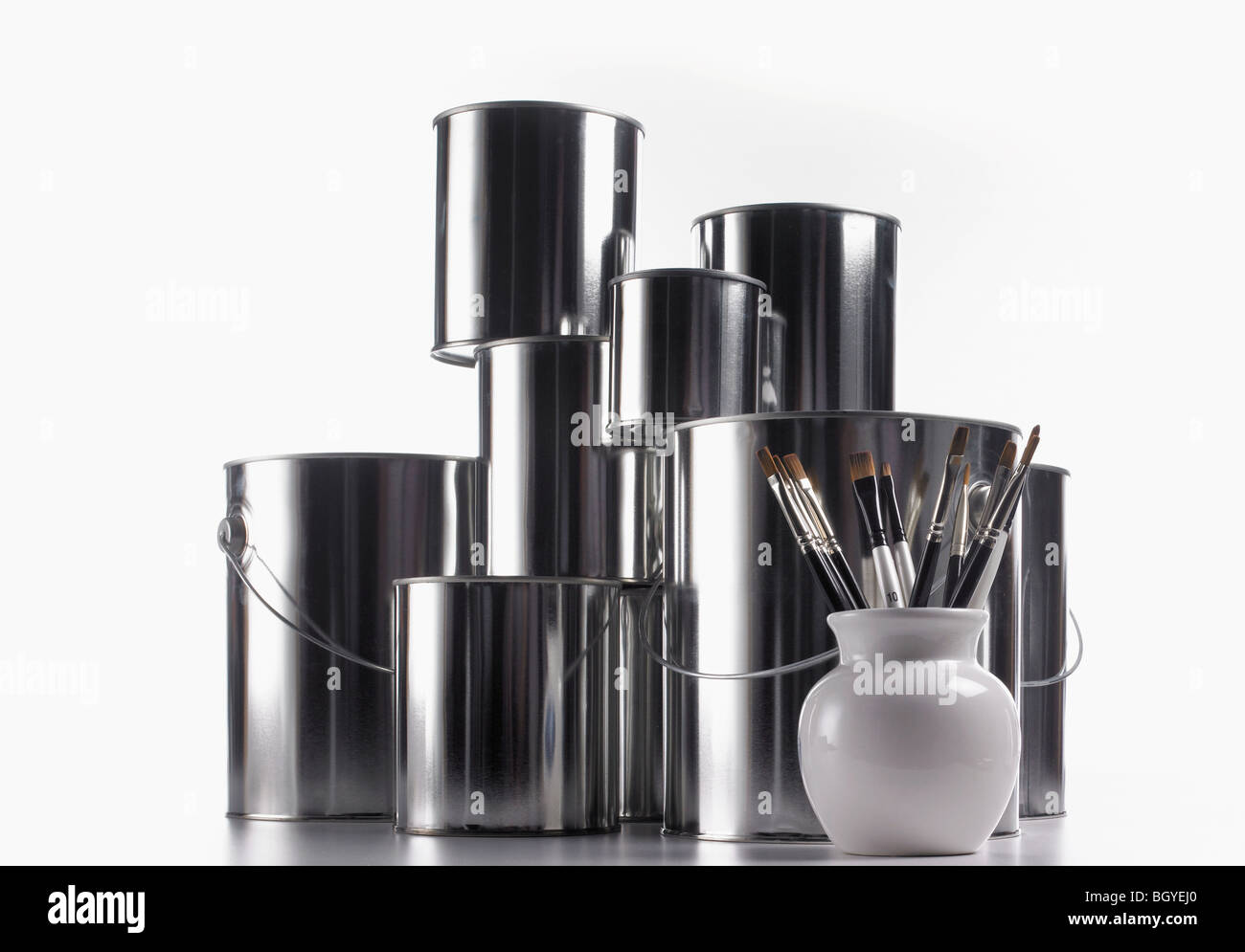 Empty paint cans and brushes Stock Photo Alamy