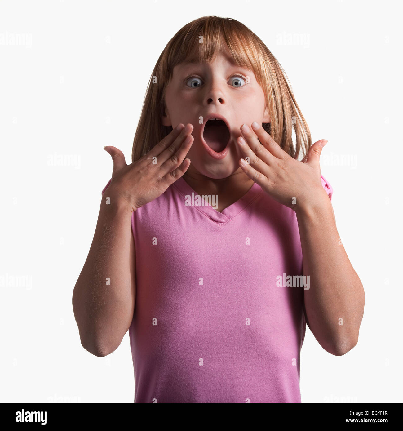 Portrait of surprised young girl Stock Photo - Alamy
