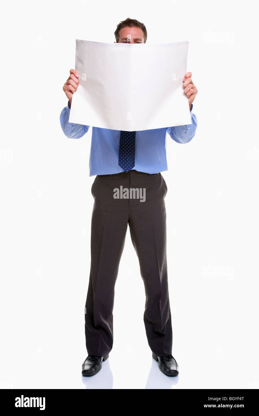 Man reading newspaper Stock Photo