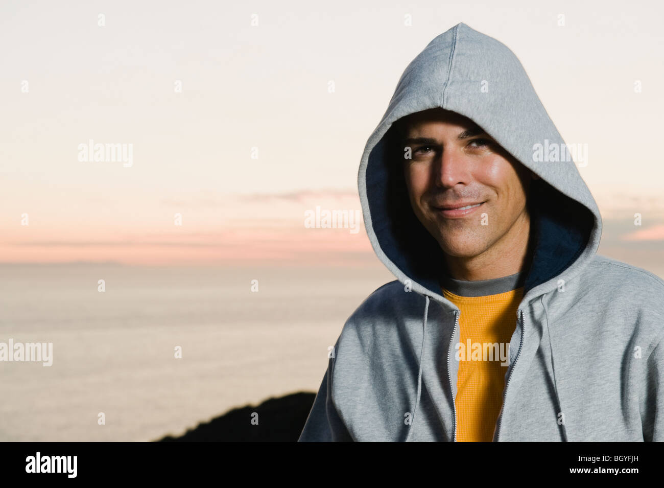 Man wearing hoodie Stock Photo