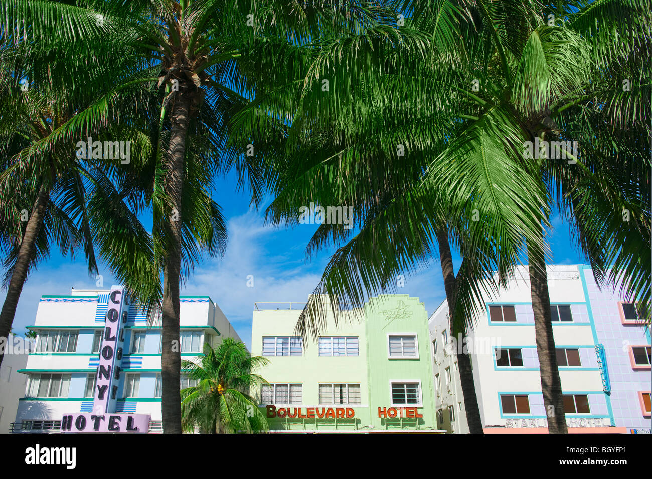 Palm trees and art deco buildings Stock Photo