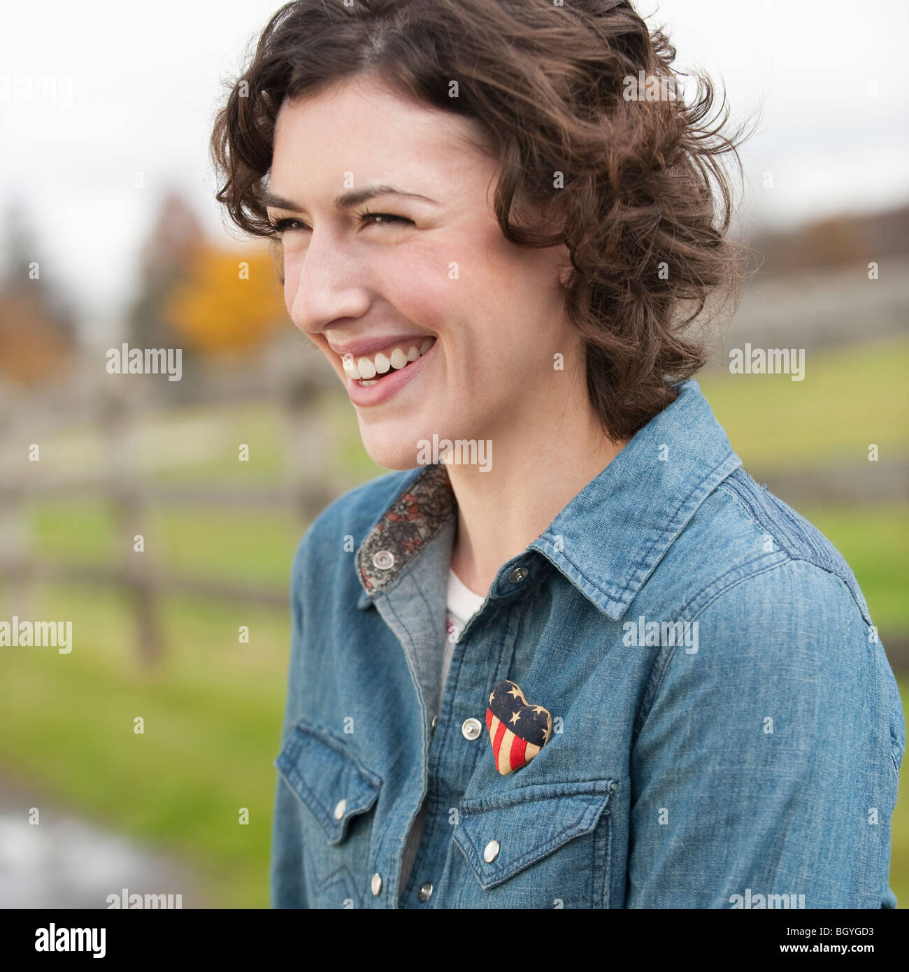 Young woman smiling outdoors iconic hi-res stock photography and images ...
